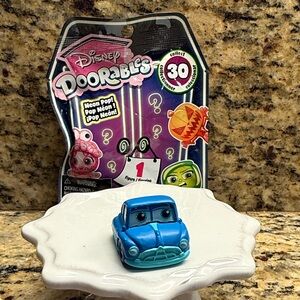 Disney Doorables Neon Pop Doc Blue Mini Car Collectible Toy